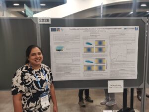 Anupama in front of her poster at AGU23